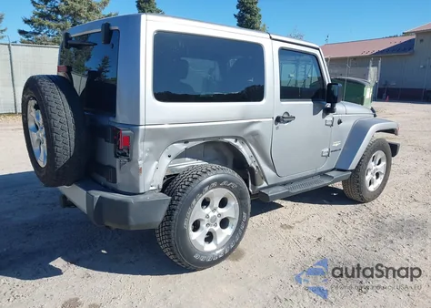 2015 Jeep Wrangler Sahara z USA, uszkodzony, nr VIN 1C4AJWBG2FL682417